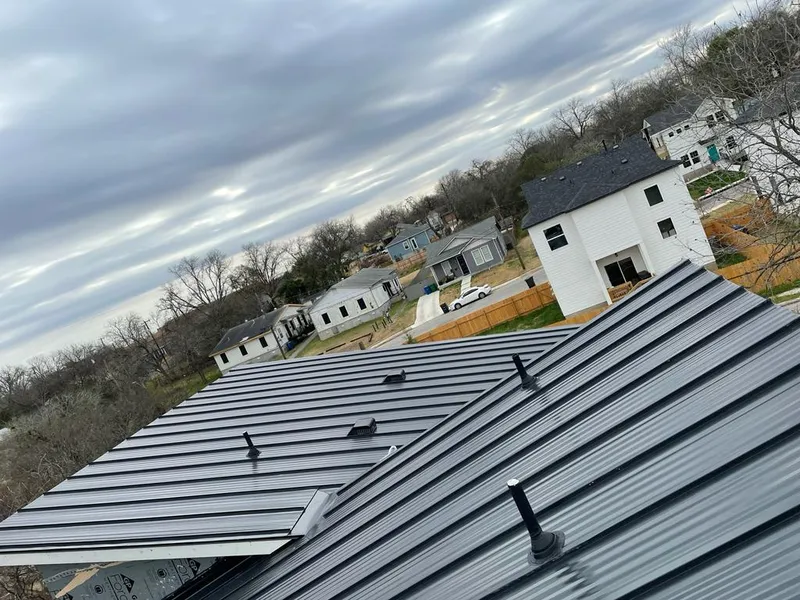 Standing seam metal roof panels with vents for Skylight Repair in Fitchburg